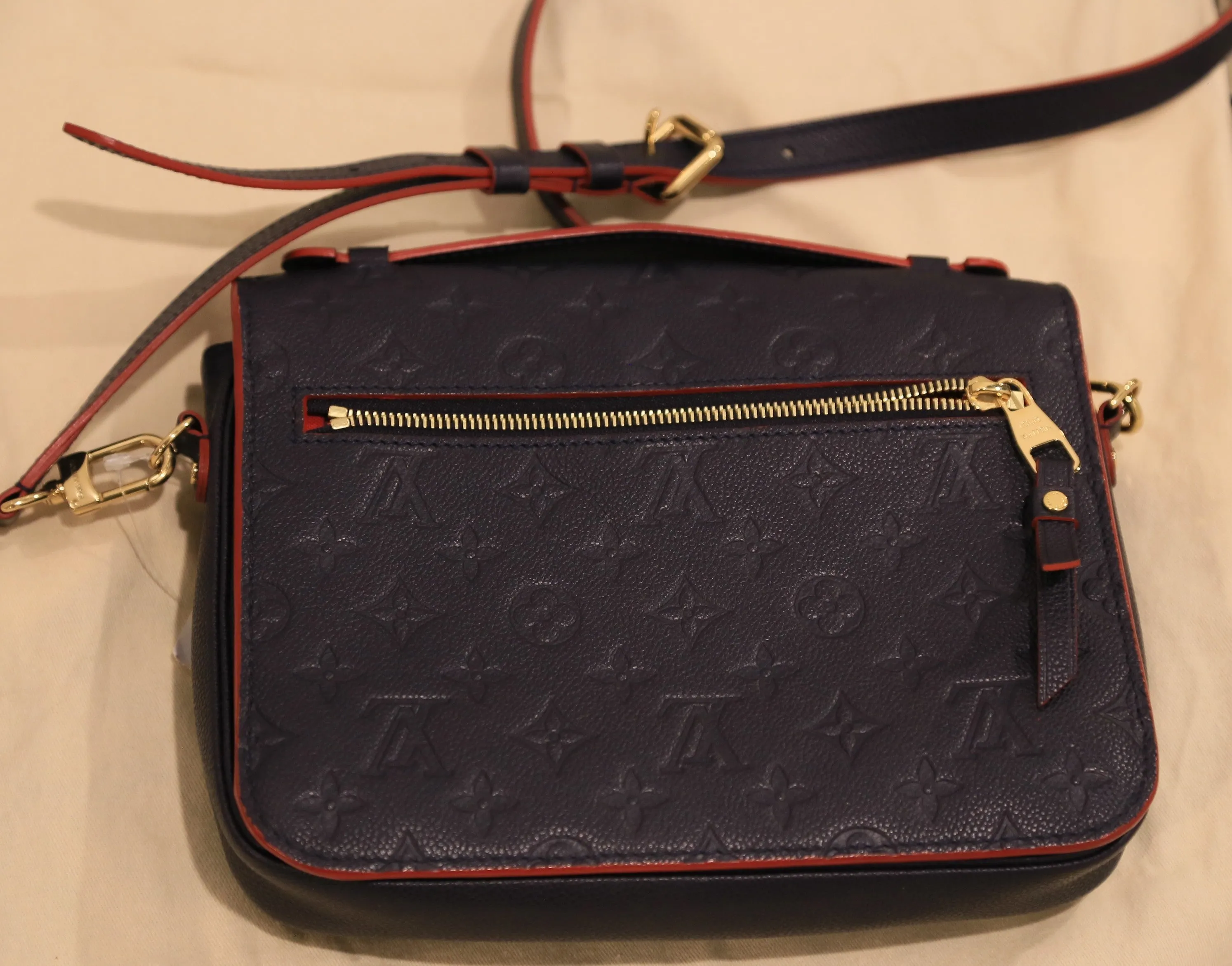 Louis Vuitton Empreinte Leather Pochette Metis