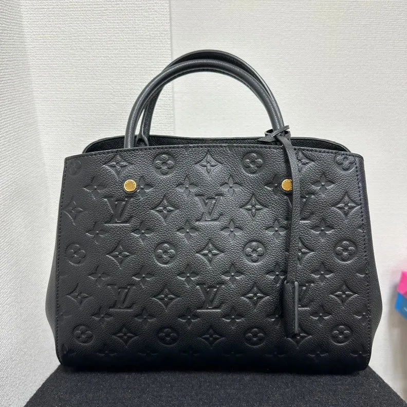 Louis Vuitton Monogram Empreinte Montaigne MM Bag,Black,Leather